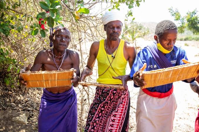 Community elders sharing traditional craft and dance on the peninsula
